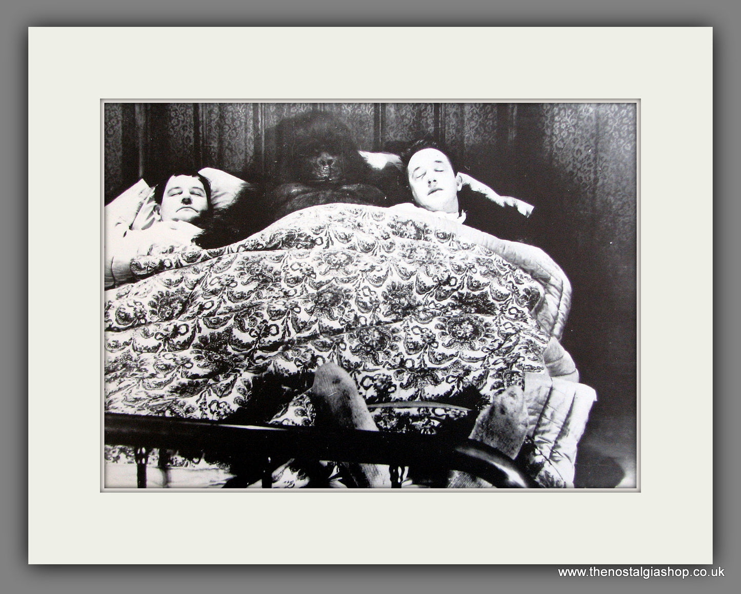 Laurel and Hardy, with Monkey. Mounted Print.