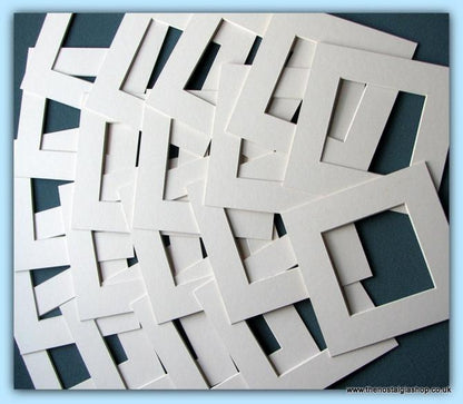 Mounts. Ivory, Size 10 x 10 Inch. Quantity  12 Mounts.