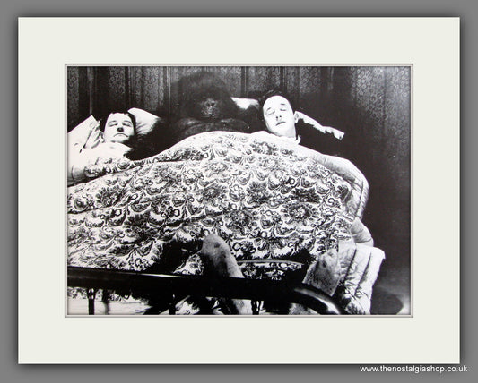 Laurel and Hardy, with Monkey. Mounted Print.